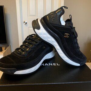 Chanel Sneakers, Women's, Size 38.5, black calf-skin with white soles.